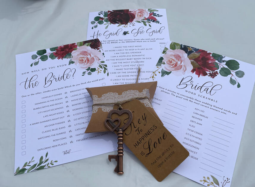 Floral bridal shower game cards with a copper key bottle opener